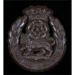 World War Two plastic economy cap badge to the York and Lancaster Regiment, in chocolate brown,