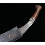 World War Two Kukri in leather scabbard, blade is 33 cm in length with no distinct markings, the