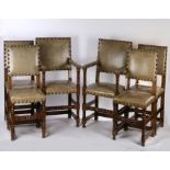 Set of Cromwellian style oak dining chairs, each with leather pad back and stuff over seats on