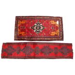 Persian rug, the central medallion with a red field with birds, coffee pots and flowers, a row of