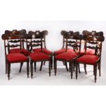 Set of eight Regency mahogany dining chairs, the arched bar backs above a shell scroll and arch