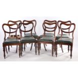 Set of eight Victorian mahogany balloon back dining chairs, with upholstered drop in seats, on