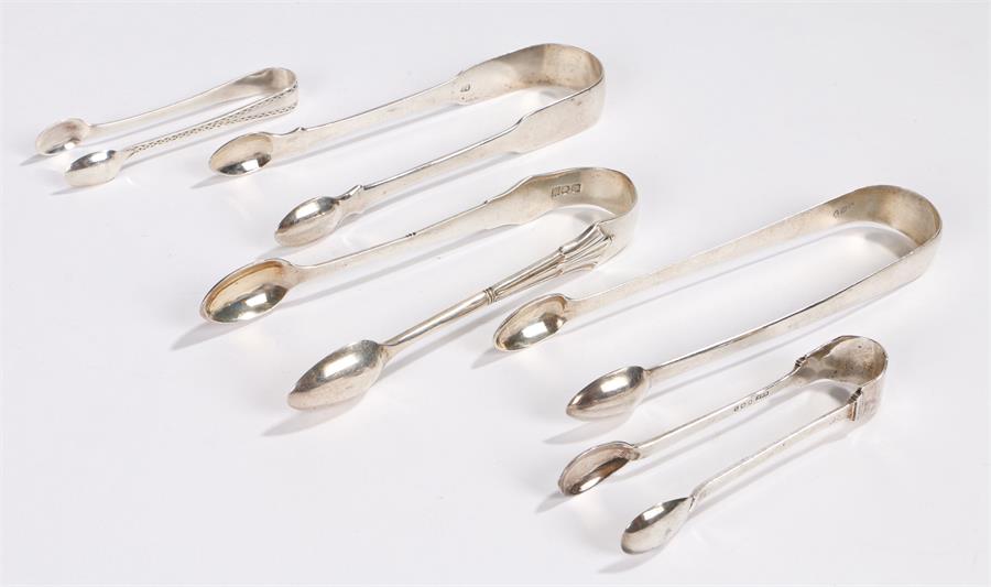 Five pairs of George III and later silver sugar tongs, various dates and makers, 5.5oz, (5)