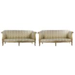 Pair of Louis XVI style canapes, with gilt scrolled acanthus leaf carved arms, upholstered in a