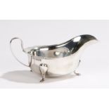 George V silver sauce boat, Sheffield 1931, maker Emile Viner, with loop handle and wavy rim, raised