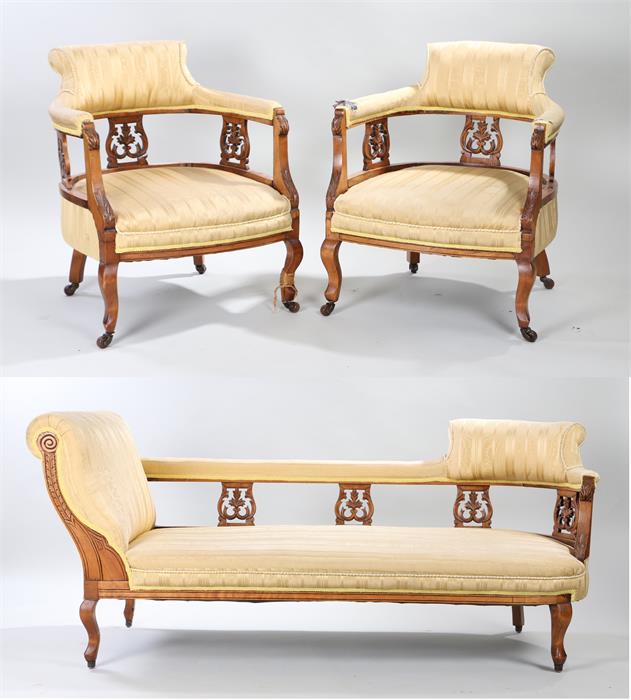 Late Victorian mahogany parlour suite, comprising of a chaise lounge and two armchairs, with