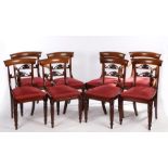 Set of eight Regency mahogany dining chairs, the curved cresting rails above pierced shell and