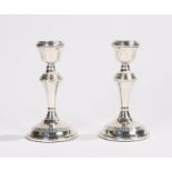 Pair of Elizabeth II silver candlesticks, Birmingham 1968, maker W I Broadway & Co, with reeded