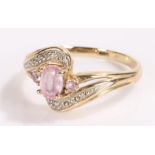 9 carat gold ring, set with a pink stone, ring size P