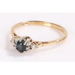 9 carat gold sapphire set ring, with a central sapphire, ring size L