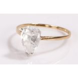 9 carat gold ring, set with a clear pear shape stone, ring size P 1/2