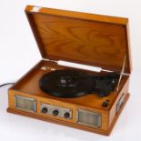 Ed Sheeran's record player, Steepletone, in an oak effect case, USB and SD slot to the side, the