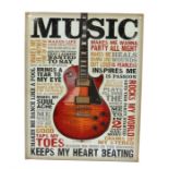 Ed Sheeran's metal bedroom sign, 'Music' and a picture of a guitar and text surround, 32cm wide. All