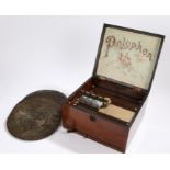 Victorian mahogany Polyphon, the square case with white painted Polyphon to the top and a printed