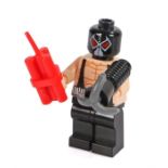 Ed Sheeran's DC comics Lego man, Bane with dynamite and grabble gun . All of the Ed Sheeran