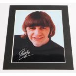 Ringo Starr colour photo signed in silver pen, with Certificate of Authenticity from Autograph Store