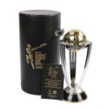 Ed Sheeran's replica ICC Cricket World Cup 2015 trophy, housed within a leather clad case, 21cm