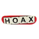 Ed Sheeran's Hoax skateboard board, natural wood top with Hoax underneath with red edge. All of