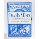 Grateful Dead - Dead In A Deck. Package containing picture disc cd, photos & deck of Grateful Dead