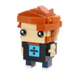 Ed Sheeran's Lego man, Made by Ed Sheeran of Ed Sheeran with Divide logo to the t-shirt. All of