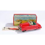 Schuco Radio 4012 red clockwork car, with key and instructions, housed in original box