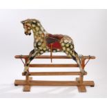 Early 20th Century rocking horse, the painted body with horse hair mane above the pine rocker
