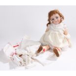 Jutta German porcelain bisque headed doll, stamped to the back of the neck 1349 Jutta S & H 9,