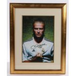 David Beckham signed photograph, wearing the Real Madrid jersey, signed in pen and numbered 23,