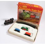 Hornby RS.691 clockwork goods set, housed in original box, together with a non-contemporary engine