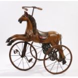 Victorian style horse tricycle, the wooden horse body with carved mane and horsehair tail, wrought