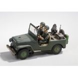 Tin plate US army jeep, made in Japan, two figures to the front seats, battery operated