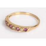 9 carat gold ring, set with pink stones