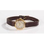 18 carat gold ladies wristwatch, with a silvered dial with Roman hours