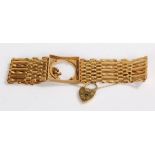 9 carat gold bracelet, with a coin slot to the centre, 19.6 grams