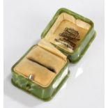 Bakelite green marble effect ring box, the internal silk inset lid with Bravingtons retail name