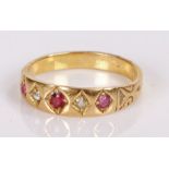 Ruby and diamond set ring, with three round cut rubies and two diamonds, ring size K