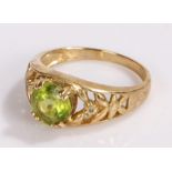 9 carat gold ring, with a green stone set head, ring size N