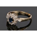 9 carat gold diamond and sapphire ring, with a central sapphire and diamond surround, ring size N