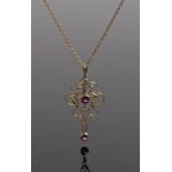 9 carat gold amethyst and pearl set pendant necklace, the pendant with two round cut amethyst and