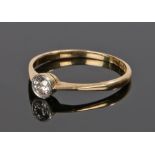 18 carat gold diamond solitaire ring, with a central round cut diamond, ring size N