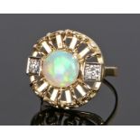 14 carat gold Rudolf Feldman opal and diamond set ring, the central circular opal with a diamond