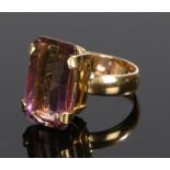 18 carat gold ametrine set ring, the ametrine at approximately 6 carats emerald cut, ring size Q