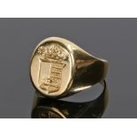 Signet ring, in yellow metal with a heraldic crest to the head, ring size U, 11.3 grams