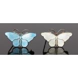 David Anderson silver and guilloche enamel butterfly brooches, in white and in blue signed to the