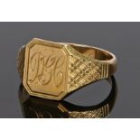 18 carat gold signet ring, with a monogram to the head and crisscross shoulders, 7.9 grams, ring