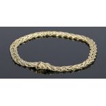 14 carat gold bracelet, with curved links to the clasp, 16.7 grams