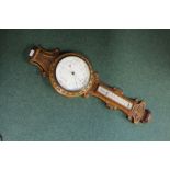 Edwardian oak cased barometer/thermometer, with scroll and acanthus leaf carved decoration, 89cm x