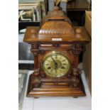 Junghans 20th century mantel clock, the mahogany case with reeded columns, the dial with Roman