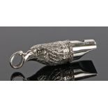 Silver whistle in the form of an eagle head