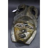 Carved African hardwood mask, 39cm high